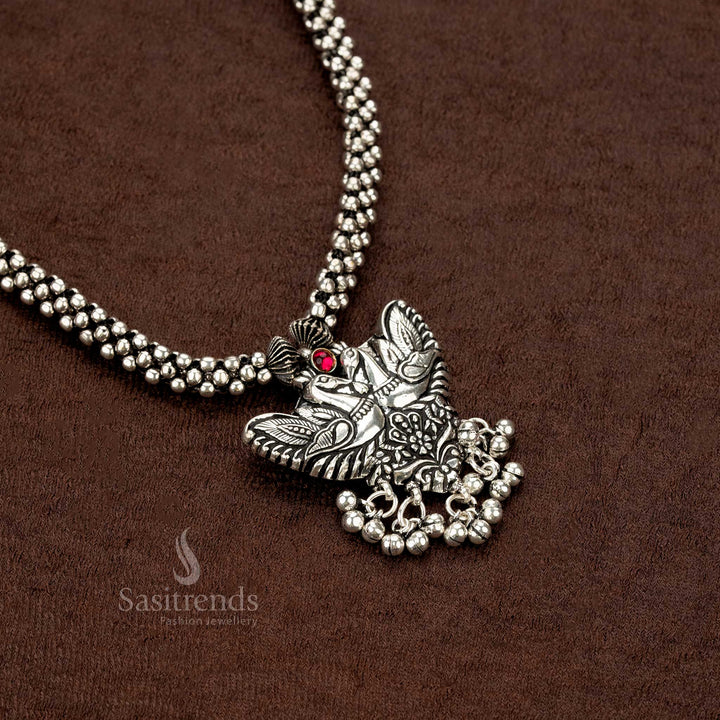 Stunning oxidised dual peacock pendant necklace set with an elegant beaded chain and matching earrings, crafted with premium artisan jewellery detailing - Sasitrends