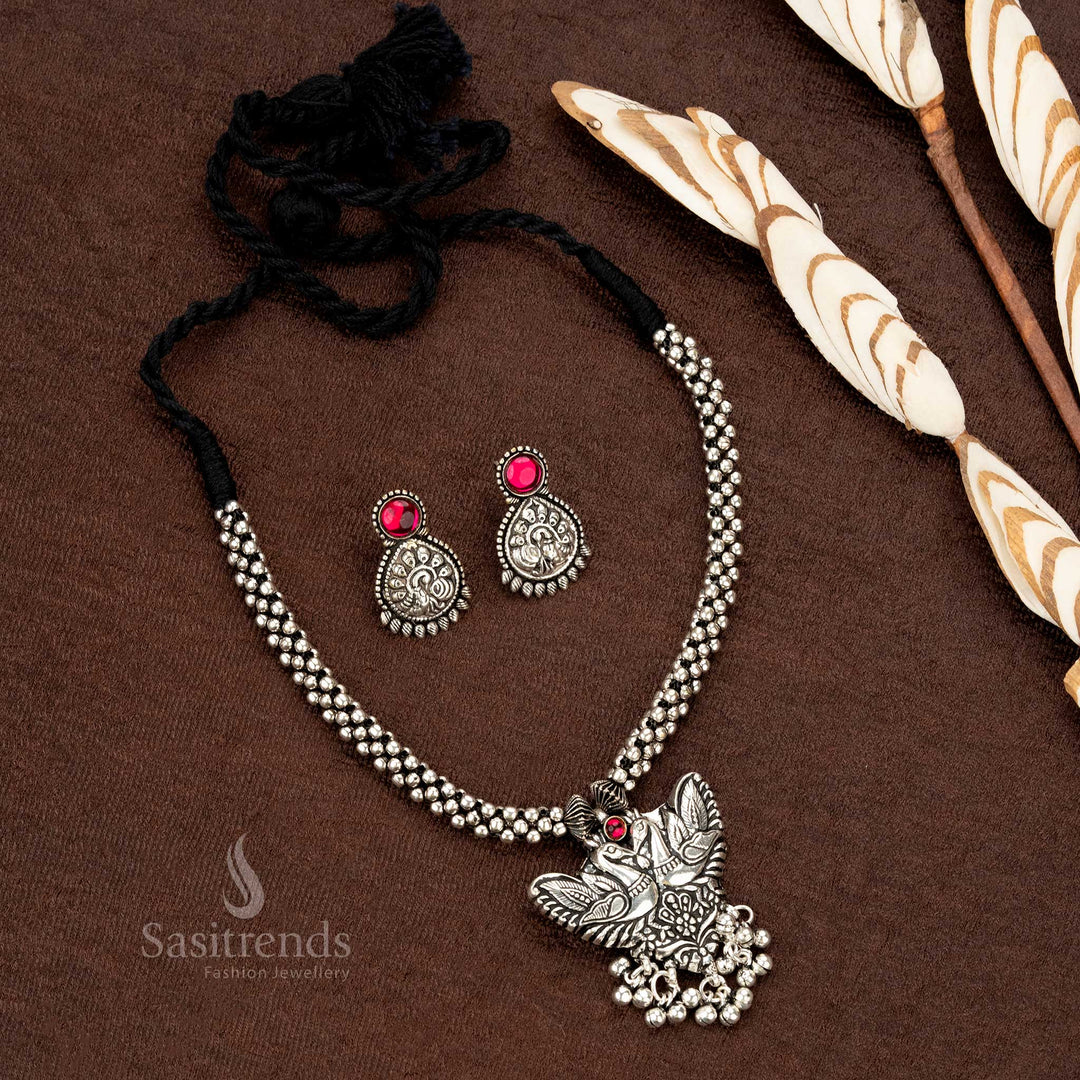Antique-finish oxidised dual peacock pendant necklace set with a stylish beaded chain and ethnic earrings, a masterpiece of handcrafted jewellery - Sasitrends