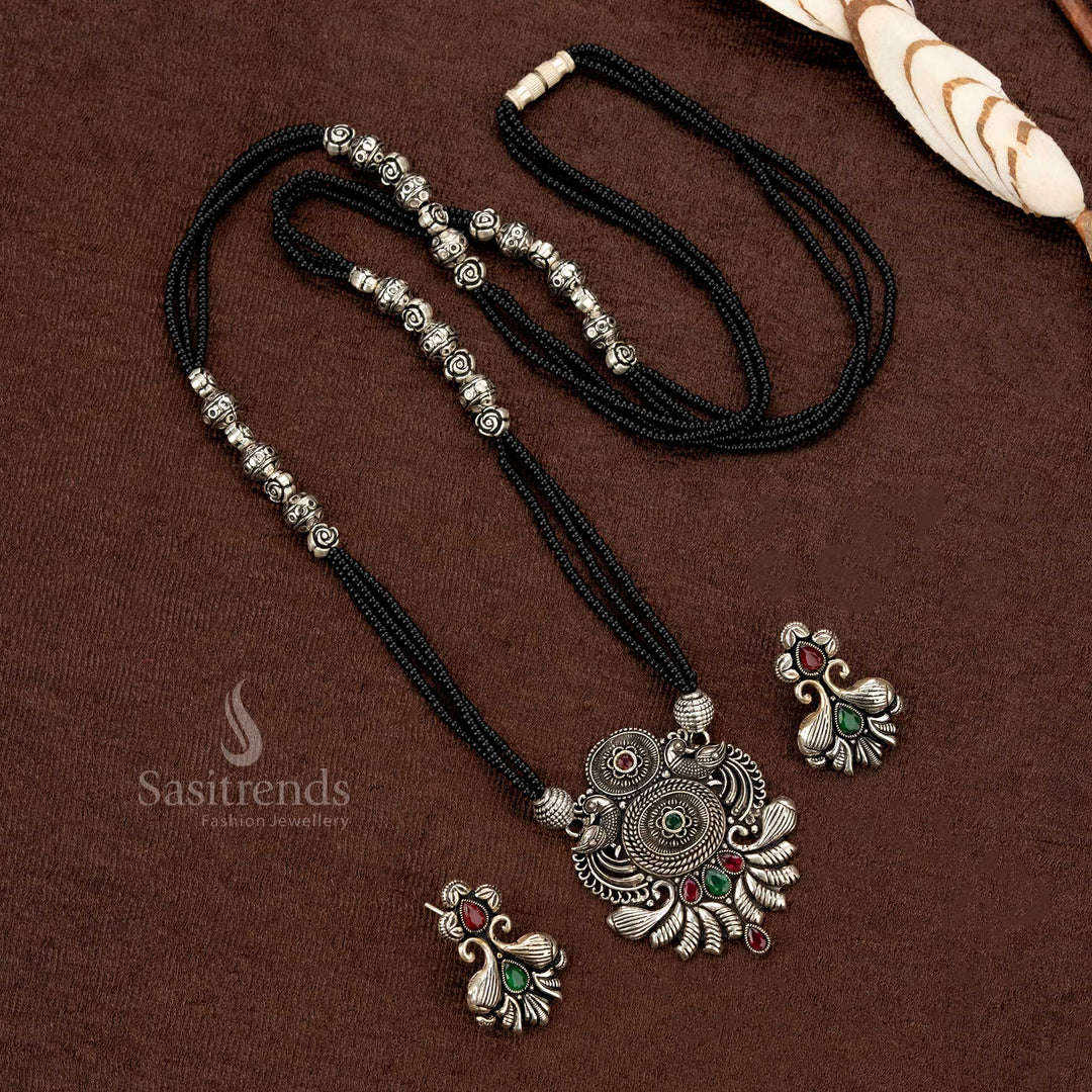 Intricately designed oxidised necklace set with floral and circular embellishments - Sasitrends