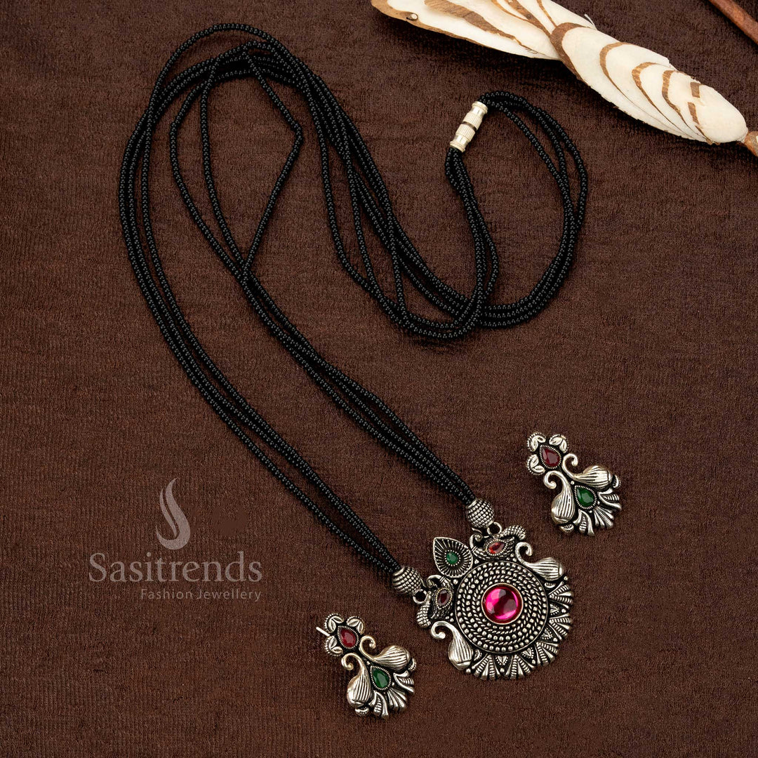 Intricately designed oxidised necklace set with floral and circular embellishments - Sasitrends