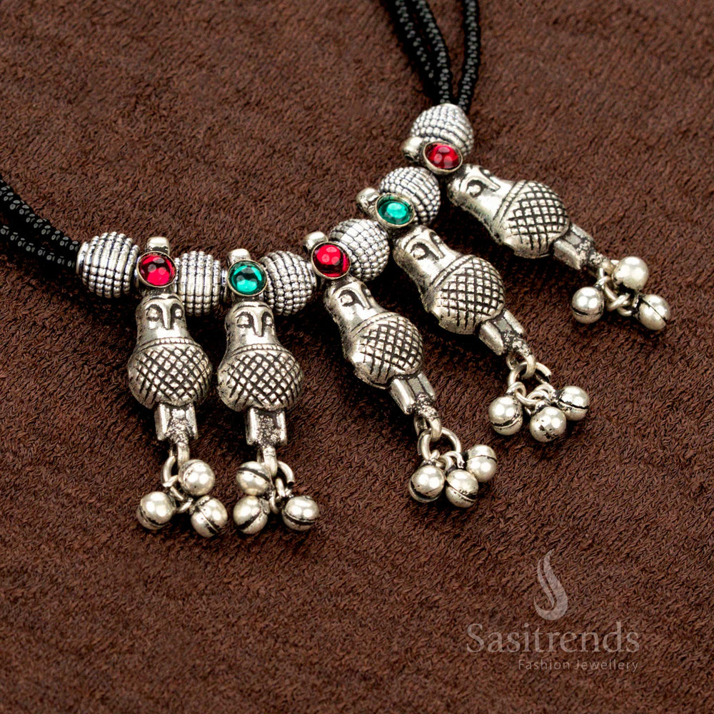 Black beaded mangalsutra with peacock earrings and oxidised finish – Sasitrends