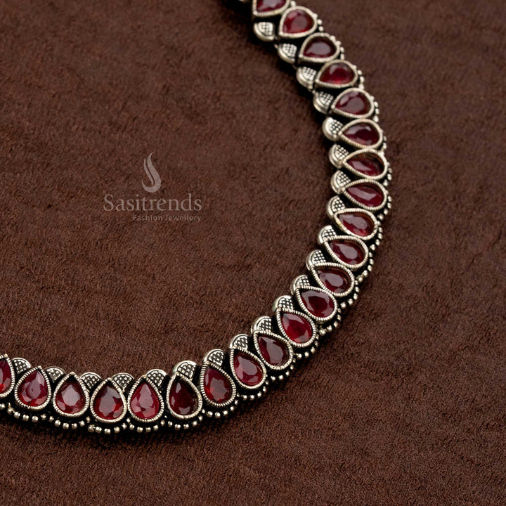 Handcrafted German silver oxidised necklace jewellery set with dazzling Monalisa ruby stones, a perfect fusion of vintage and modern fashion - Sasitrends
