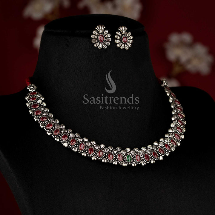 Oxidised oval stone necklace set with thread closure and matching earrings, featuring deep ruby-colored stones, perfect for ethnic and festive jewellery collections - Sasitrends