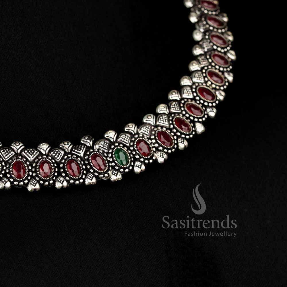 Oxidised oval stone necklace set with thread closure and matching earrings, featuring deep ruby-colored stones, perfect for ethnic and festive jewellery collections - Sasitrends 