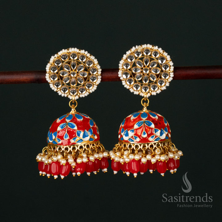 Stunning red-lite blue gold plated pearl jhumka earrings featuring exquisite kundan detailing, perfect for temple and royal celebrations - Sasitrends
