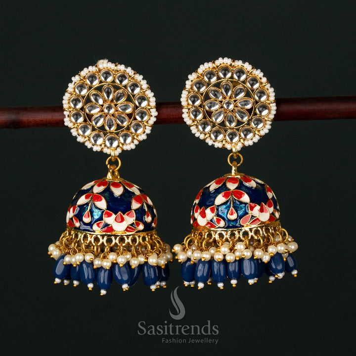 Breathtaking blue-red gold plated pearl jhumka earrings with an artistic kundan-studded design, a must-have for traditional wedding celebrations - Sasitrends
