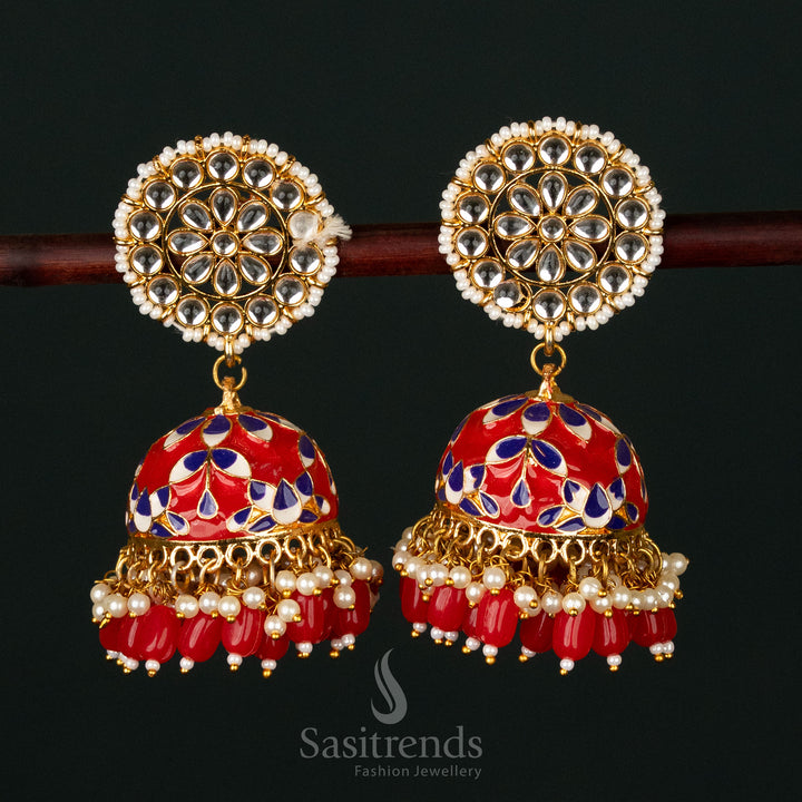 Striking red-dark blue gold plated pearl jhumka earrings adorned with intricate kundan work, a perfect fusion of vintage and ethnic charm - Sasitrends