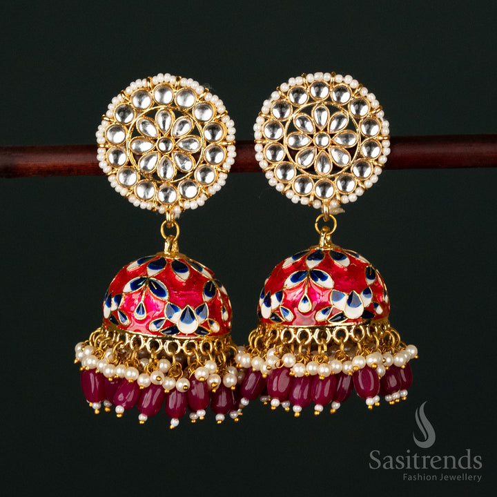 Bold red-black gold plated pearl jhumka earrings with a classic ethnic touch, featuring intricate kundan craftsmanship for festive elegance - Sasitrends