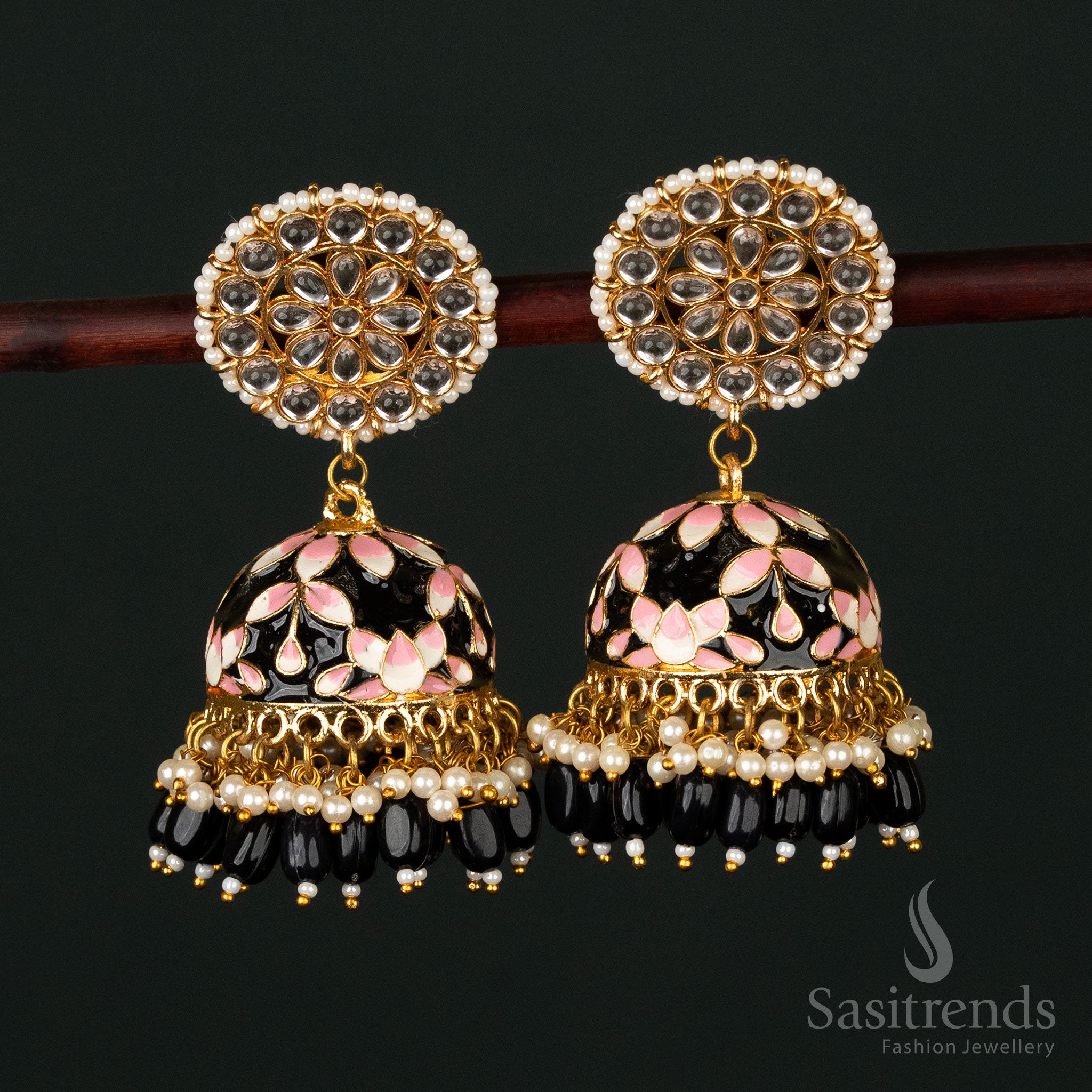 Sophisticated black-pink gold plated pearl jhumka earrings with intricate kundan stone artistry, making an elegant traditional statement - Sasitrends