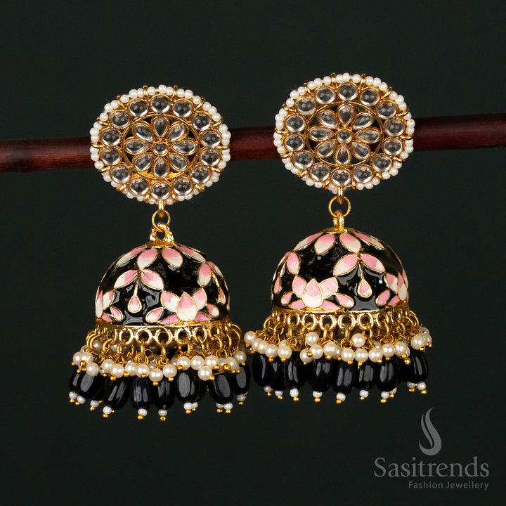 Sophisticated black-pink gold plated pearl jhumka earrings with intricate kundan stone artistry, making an elegant traditional statement - Sasitrends