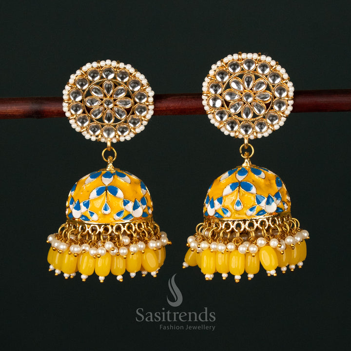 Dazzling yellow-blue gold plated pearl jhumka earrings crafted with kundan artistry, an enchanting piece for bridal elegance and festive fashion - Sasitrends