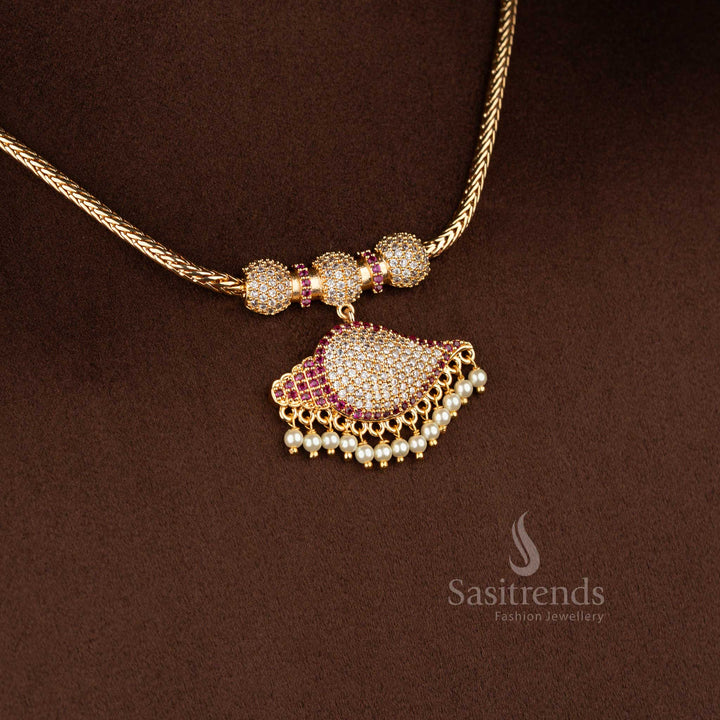 Sasitrends traditional micro gold plated pendant chain necklace designed with a broad paisley-shaped pendant structure, detailed with white AD stones and white ruby accents, finished with a flexible chain for a rich 24K real gold appearance, one gram jewellery with guaranteed quality.