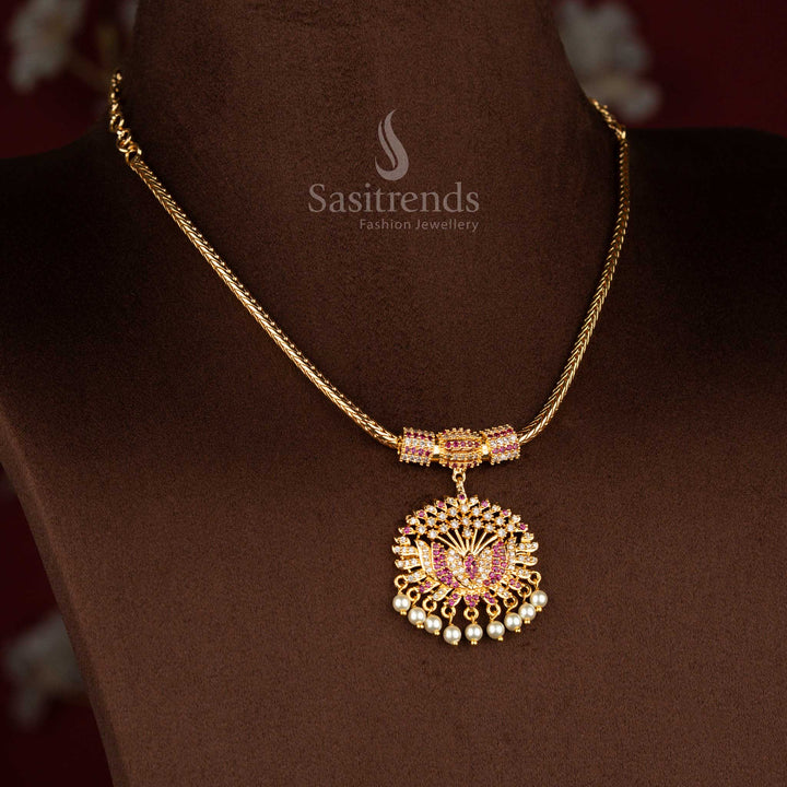 Sasitrends traditional pendant chain necklace featuring a sculpted lotus design pendant structure adorned with white AD stones and white ruby accents, paired with pearl hangings and a smooth chain for a gold-like traditional finish.