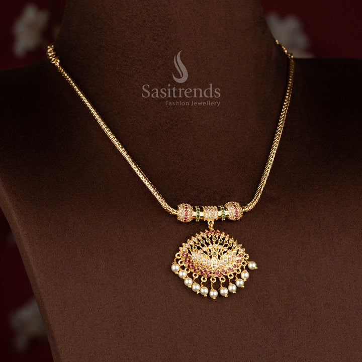 Sasitrends micro gold plated pendant chain necklace showcasing a detailed lotus motif pendant structure adorned with multi colour AD stones and pearl drops, completed with a smooth chain for an authentic traditional finish.