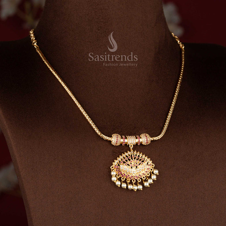 Sasitrends micro gold plated one gram pendant chain necklace crafted with a lotus motif pendant structure accented by white AD stones and white ruby highlights, finished with pearl drop detailing for a refined 24K gold-like look.