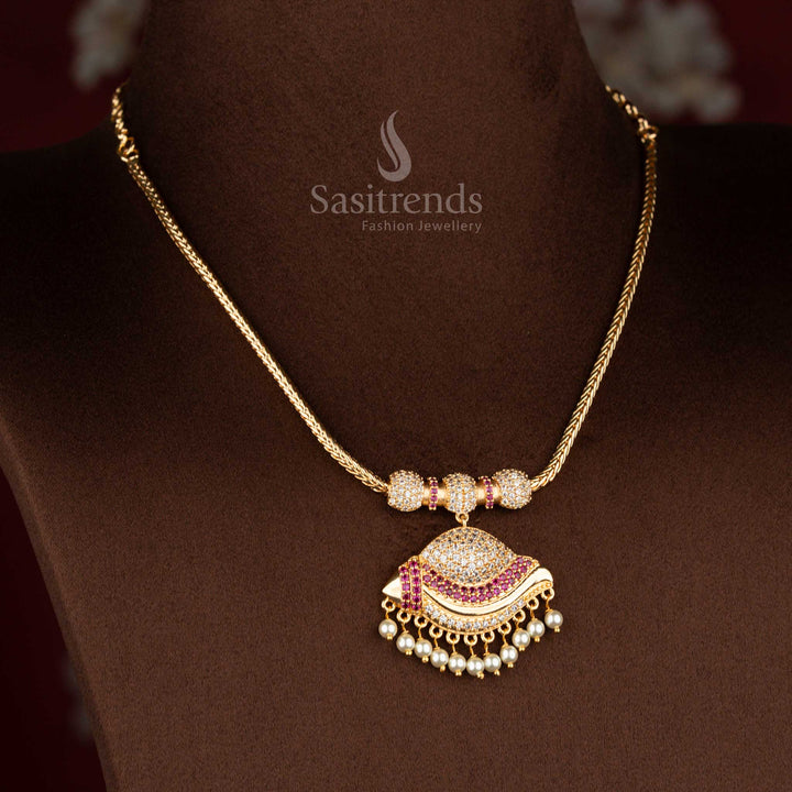 Sasitrends micro gold plated pendant chain necklace designed with a paisley crescent-inspired pendant structure detailed using white AD stones and white ruby elements, completed with pearl fringe for a refined heritage look.