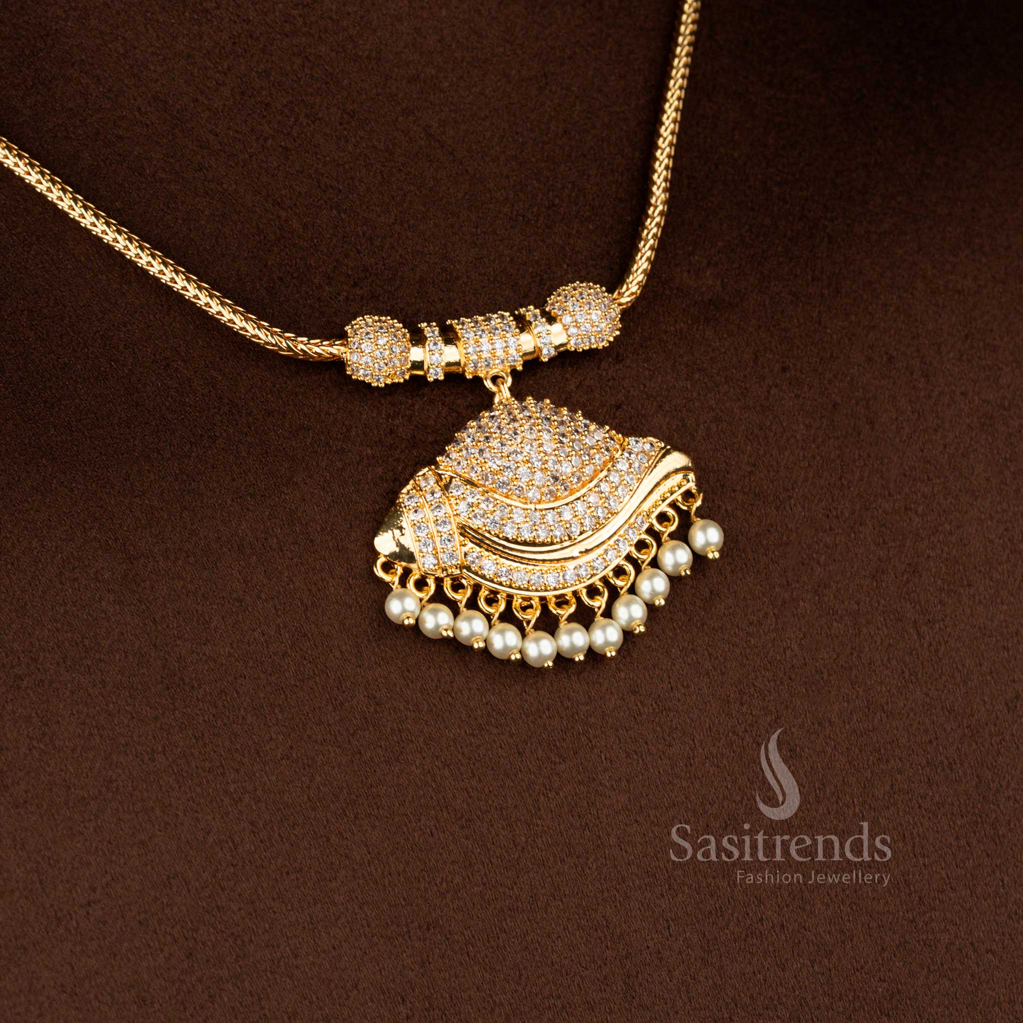 Sasitrends micro gold plated one gram pendant chain necklace featuring a layered crescent-shaped pendant structure with overlapping curved panels fully set in white AD stones, finished with pearl drop hangings and paired with a textured chain for a 24K real gold look.