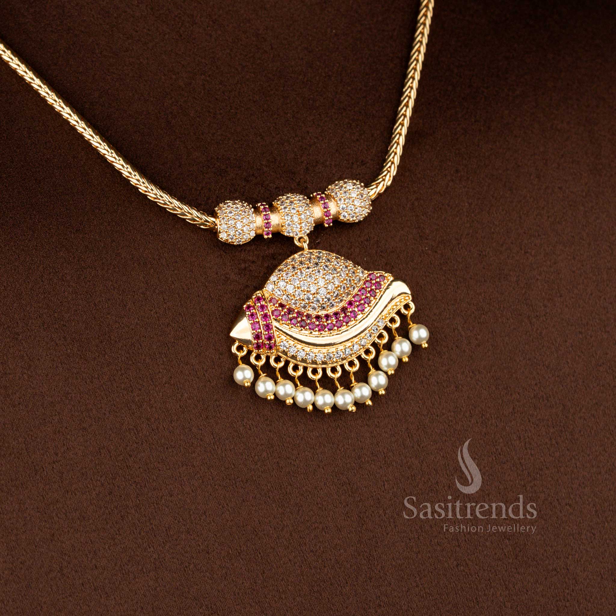 Sasitrends micro gold plated one gram pendant chain necklace crafted with a layered crescent pendant structure accented by white AD stones and white ruby highlights, finished with pearl drop hangings for a rich 24K gold-like appearance.