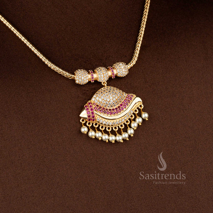 Sasitrends micro gold plated one gram pendant chain necklace crafted with a layered crescent pendant structure accented by white AD stones and white ruby highlights, finished with pearl drop hangings for a rich 24K gold-like appearance.
