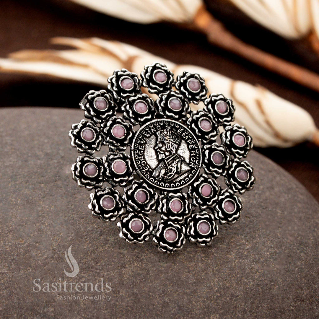 A grand vintage oxidised floral coin ring with intricate etchings and a pastel pink gemstone accent, ideal for those who love delicate yet regal jewellery - Sasitrends