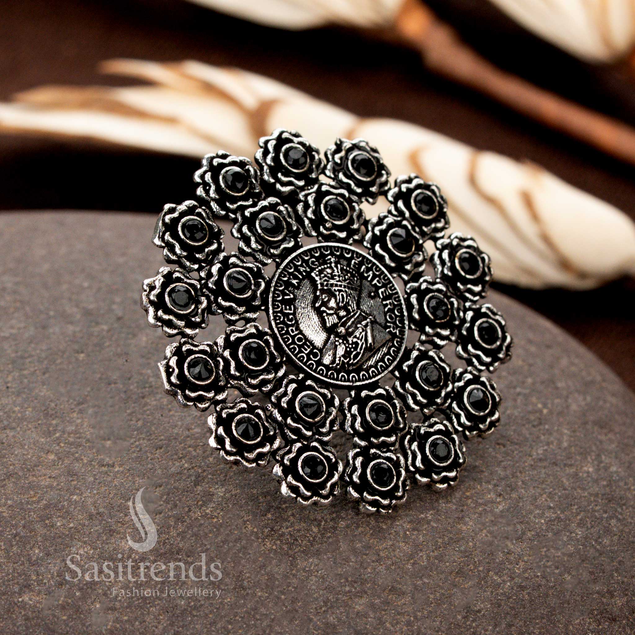  A majestic oxidised floral coin ring with detailed carvings and onyx black gemstone ornamentation, bringing a powerful and elegant aura - Sasitrends