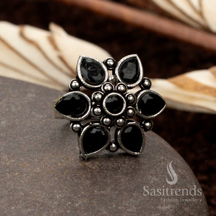 Striking oxidised floral ring with a deep black stone, symbolizing mystery and elegance - Sasitrends