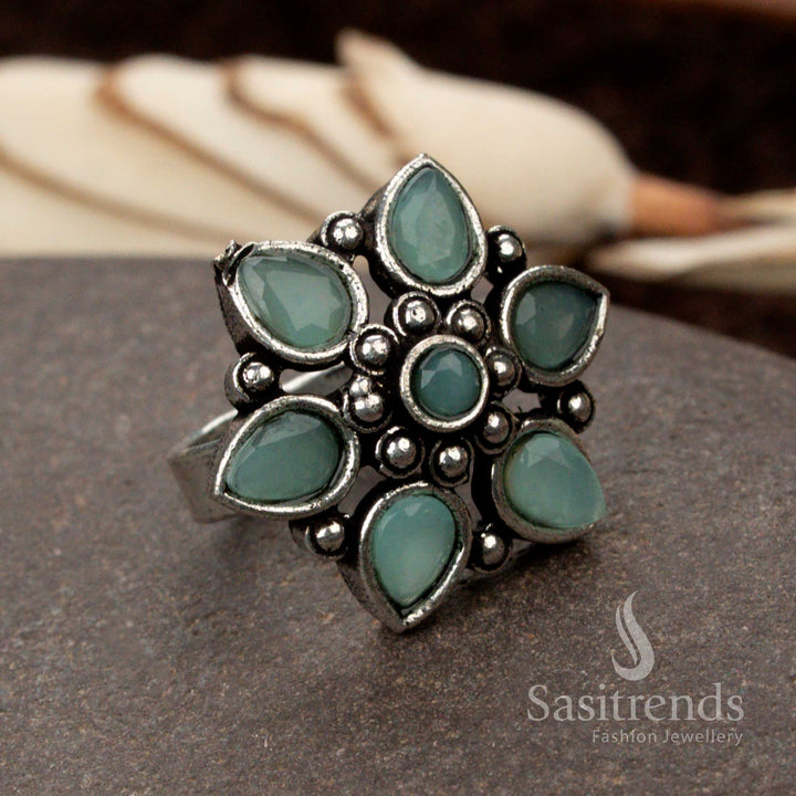 Refreshing oxidised floral design ring with a soothing mint stone, embodying freshness and uniqueness - Sasitrends
