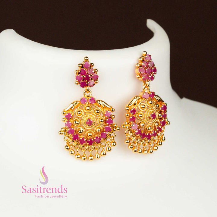 Rich ruby tone micro gold  earrings set adorned with tilak motifs and temple-style AD stones, perfect jewellery for weddings and traditional functions – Sasitrends