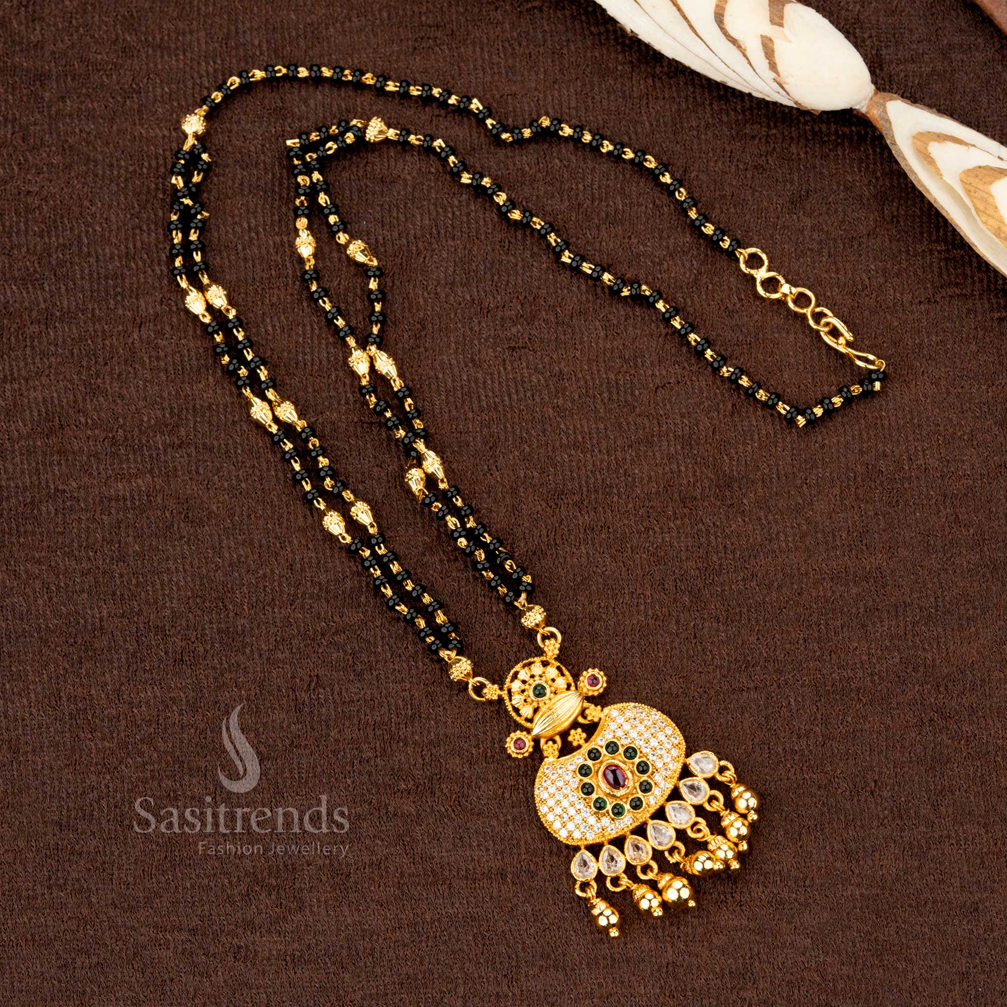 Intricate one gram gold plated AD stone-studded round floral Mangalsutra pendant chain, showcasing artistic jewellery craftsmanship - Sasitrends