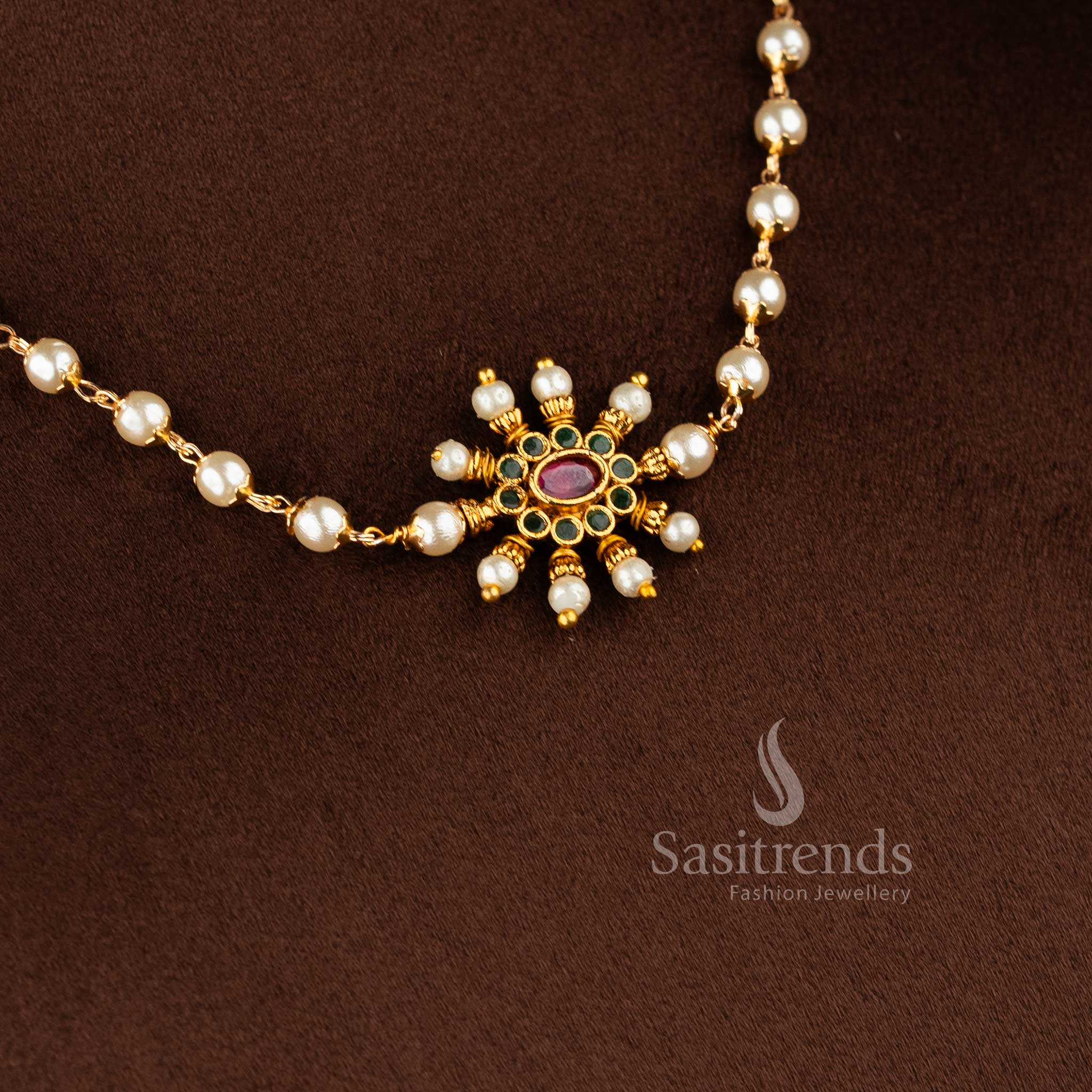 Detailed view of 1949 temple jewellery set with matching floral stud earrings and pearl accents - Sasitrends