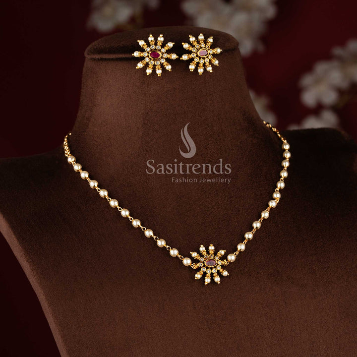Traditional matte gold necklace featuring a central sunburst floral pendant and elegant pearl string 1949 - Sasitrends