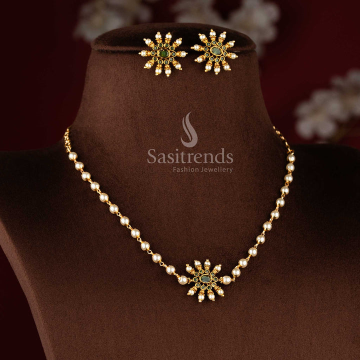 Traditional matte gold necklace featuring a central sunburst floral pendant and elegant pearl string 1949 - Sasitrends