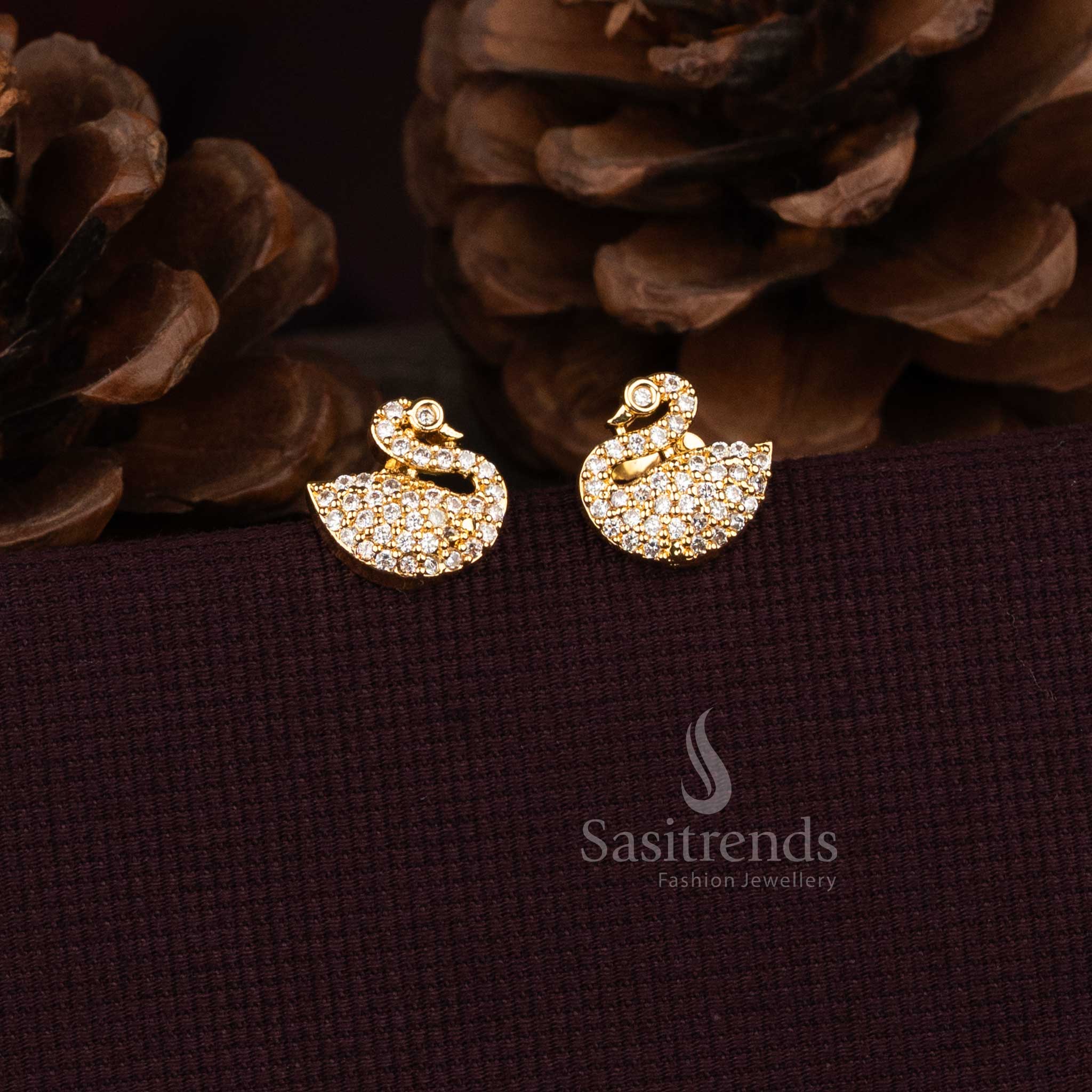 Sasitrends micro gold plated American diamond swan motif stud earrings with pavé stone detailing 