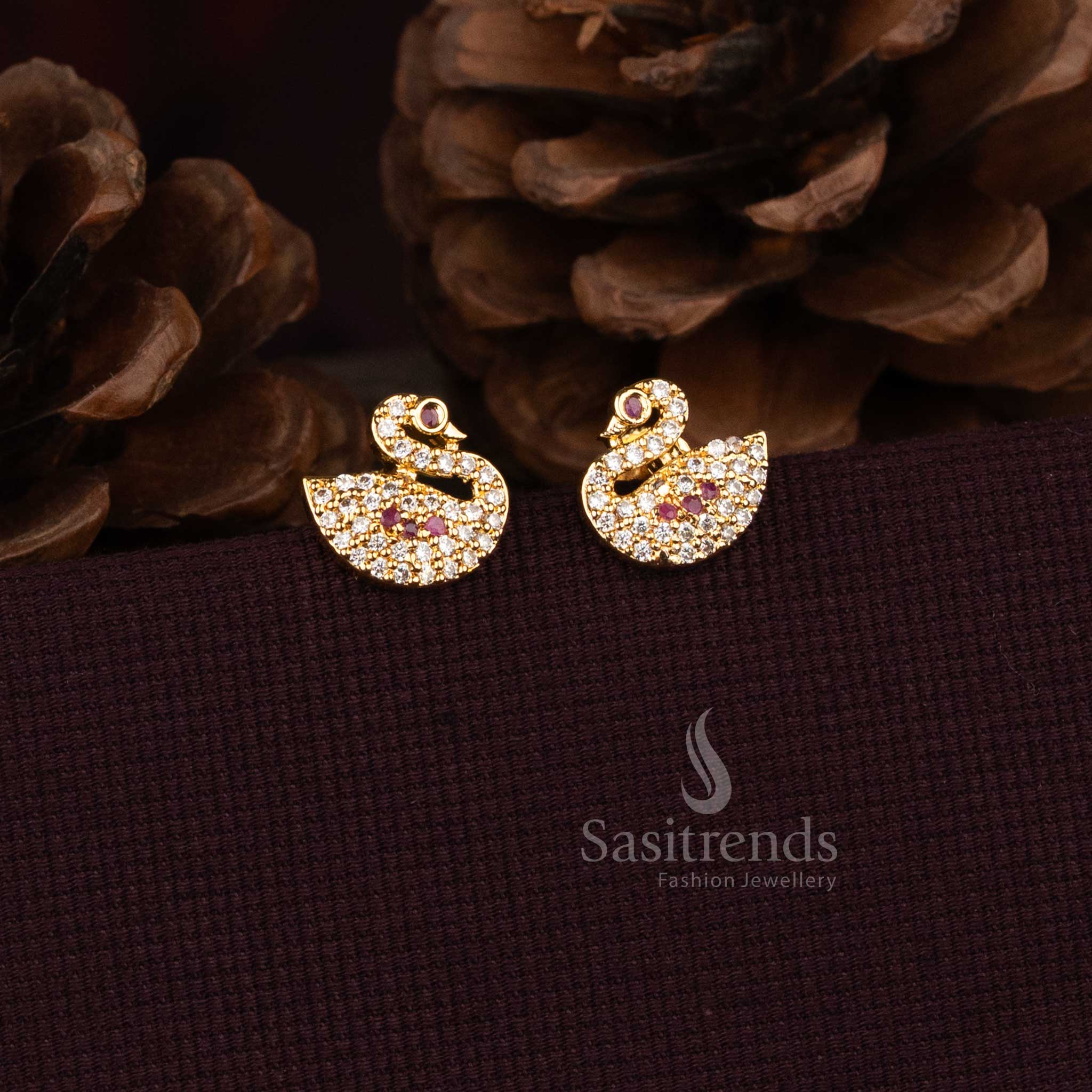Sasitrends micro gold plated designer stud earrings featuring swan motif and detailed stone setting  