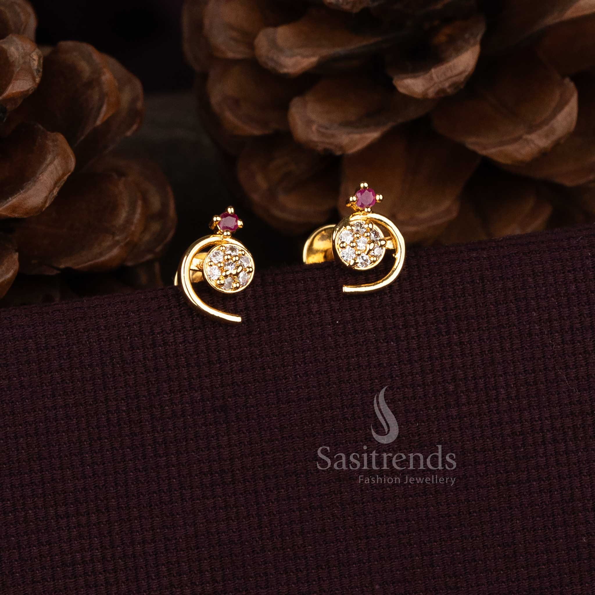 Sasitrends designer swirl earrings crafted with micro gold plating and multi layer AD stone setting  