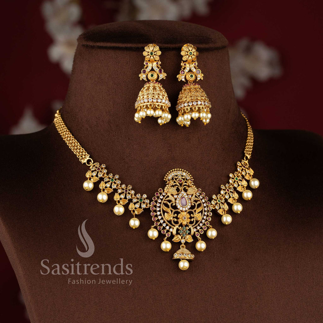 Beautiful matte gold plated AD stone studded peacock floral choker necklace jewellery set by Sasitrends.