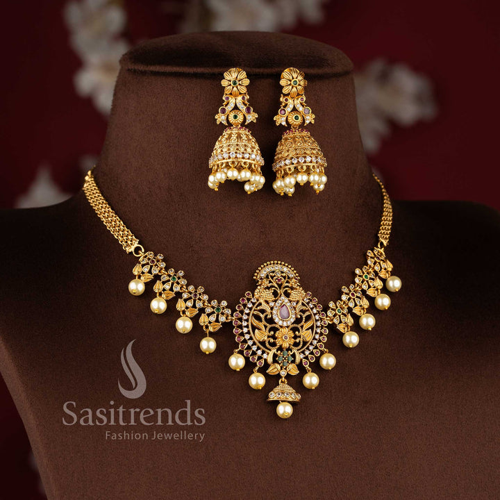 Beautiful matte gold plated AD stone studded peacock floral choker necklace jewellery set by Sasitrends.
