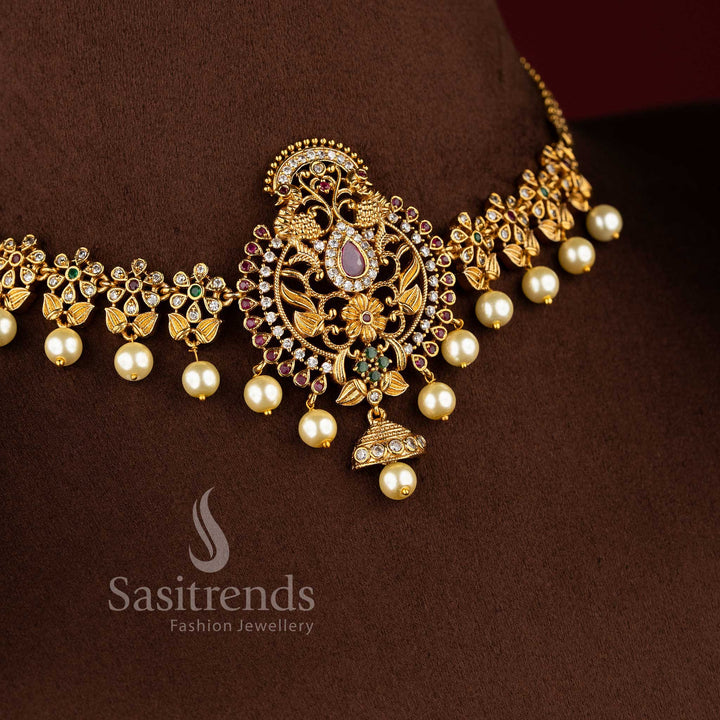  Bridal matte gold peacock floral necklace jewellery set with intricate design and sparkling stones.