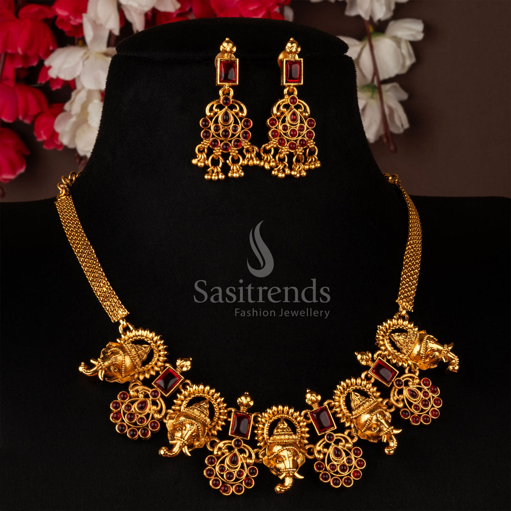 Exquisite matte gold temple choker set, showcasing a beautifully carved Ganesh pendant with deep ruby embellishments - Sasitrends