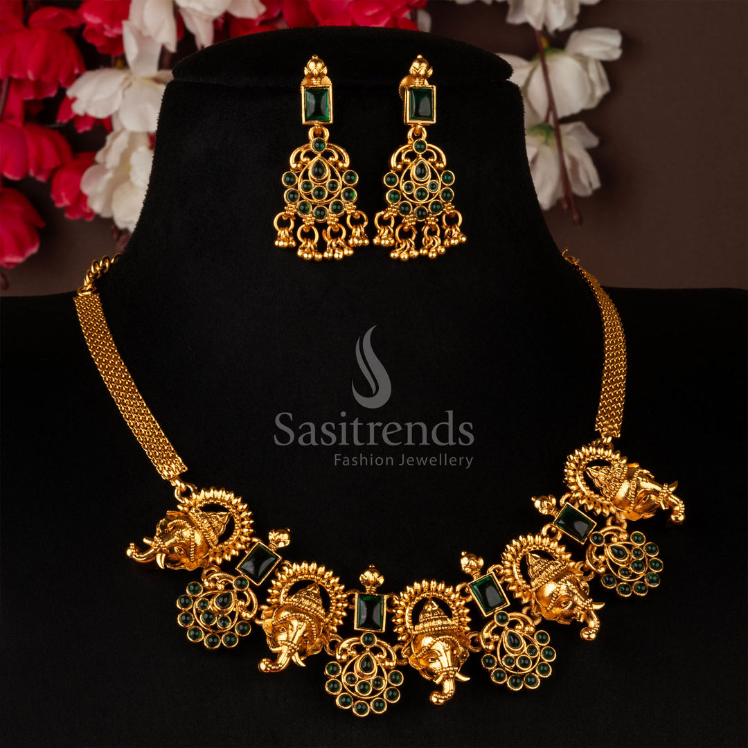 Timeless matte gold temple choker necklace set, accentuated with a sacred Ganesh pendant and dazzling green stones - Sasitrends
