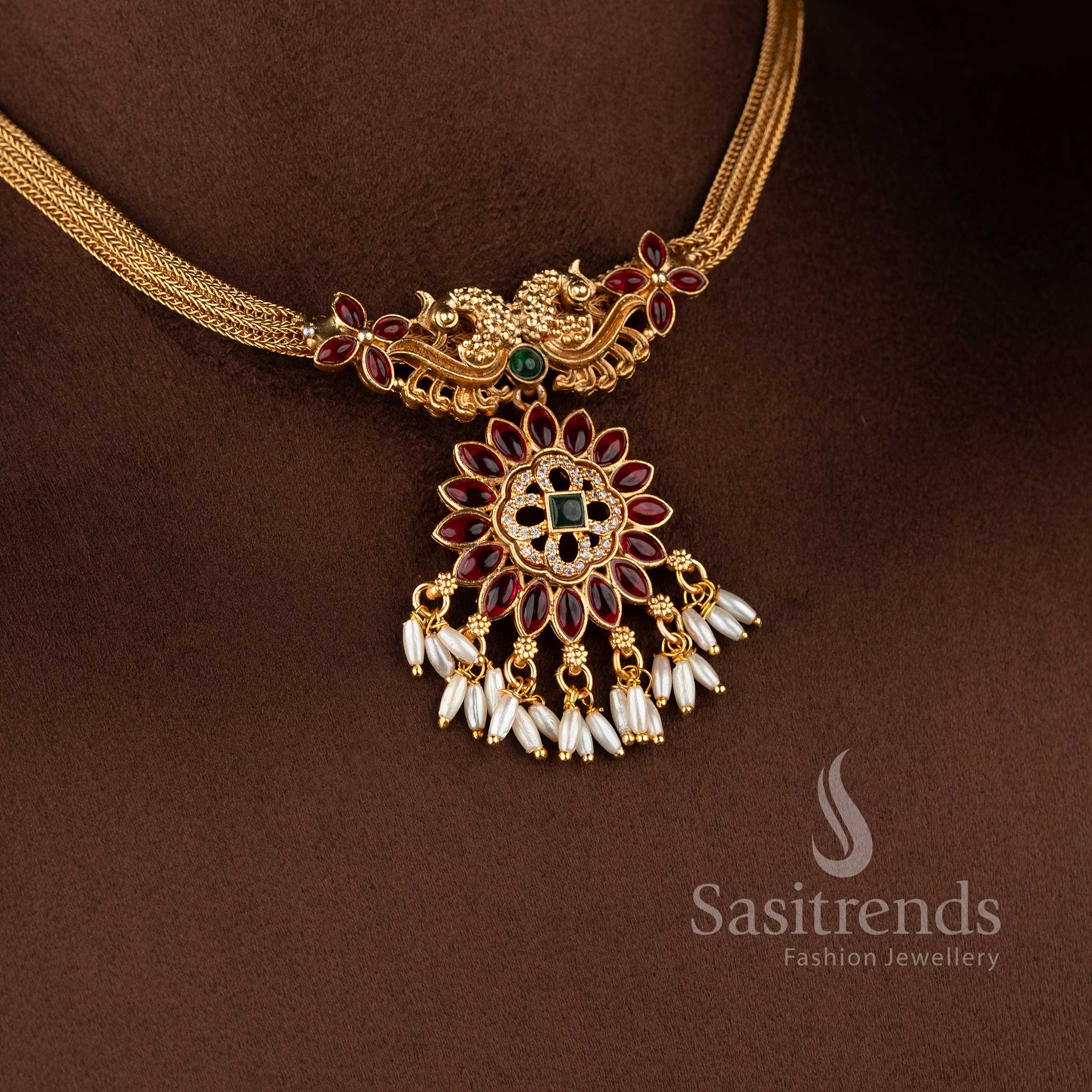Elegant classic matte gold starburst pendant with matching rice pearl jhumkas - Sasitrends
