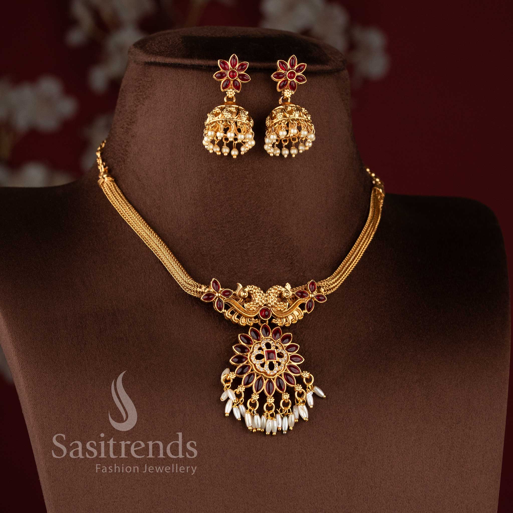 Stylish Sasitrends wedding jewellery set featuring twin peacock motifs and rice pearls in matte finish.