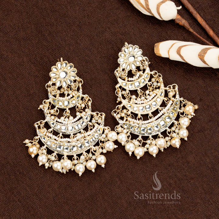 Festive gold plated maang tikka and pearl earrings set with crescent structure  - Sasitrends