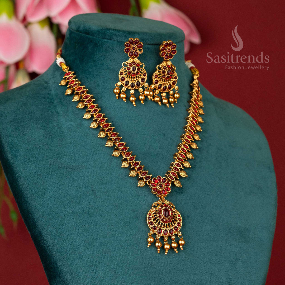 Grand and regal matte gold plated temple flower designer necklace jewellery set with intricate detailing and bold ruby embellishments, ideal for cultural celebrations - Sasitrends