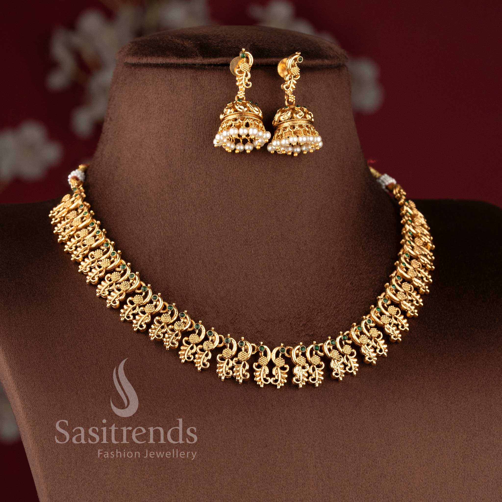 Traditional South Indian style matte gold plated necklace set with intricate peacock motifs - Sasitrends.