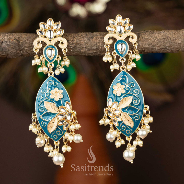 Chic gold-plated kundan earrings with blue enamel inlay and pearl drops.