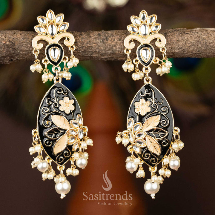 Classic black enamel kundan earrings with gold plating and pearl adornments.
