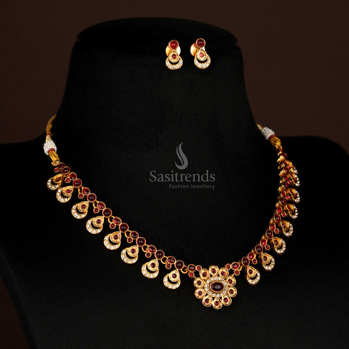 Vintage ruby tone matte gold traditional necklace set with central floral pendant and oval motifs – enchanting ethnic jewellery for cultural and festive attire – Sasitrends