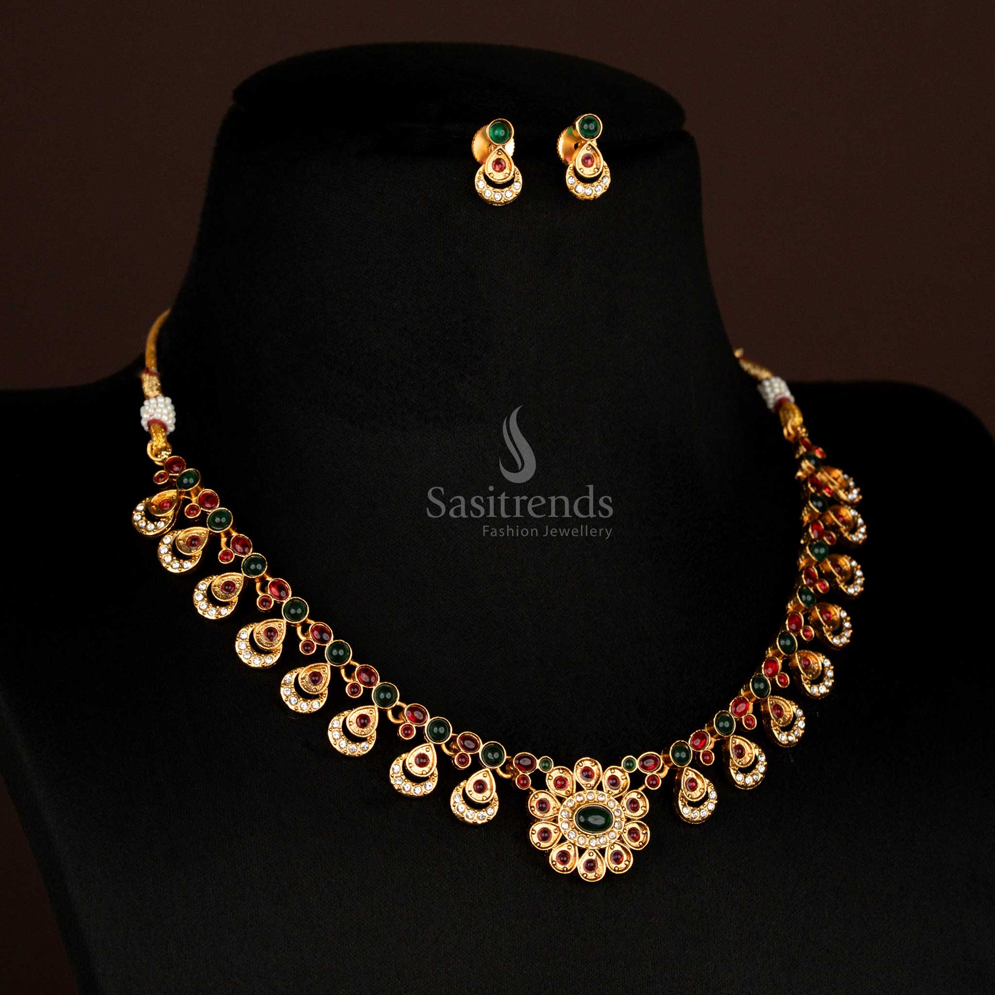 Majestic matte gold plated green-ruby floral pendant necklace set with oval drop motifs and traditional stud earrings – divine ethnic jewellery for festive saree looks – Sasitrends