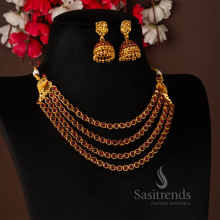 Majestic antique finish matte gold elegant peacock temple necklace jewellery set with glorious ruby stones, paired with ornate jhumka earrings for a regal traditional attire - Sasitrends
